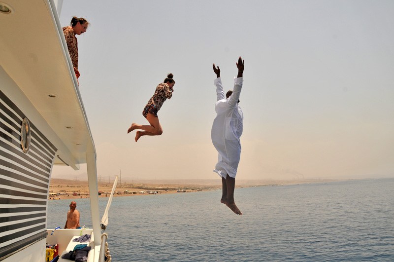 jumping into Gulf of Aqaba Jordan off yacht
