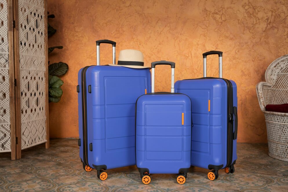 Blue luggage set ready for travel.
