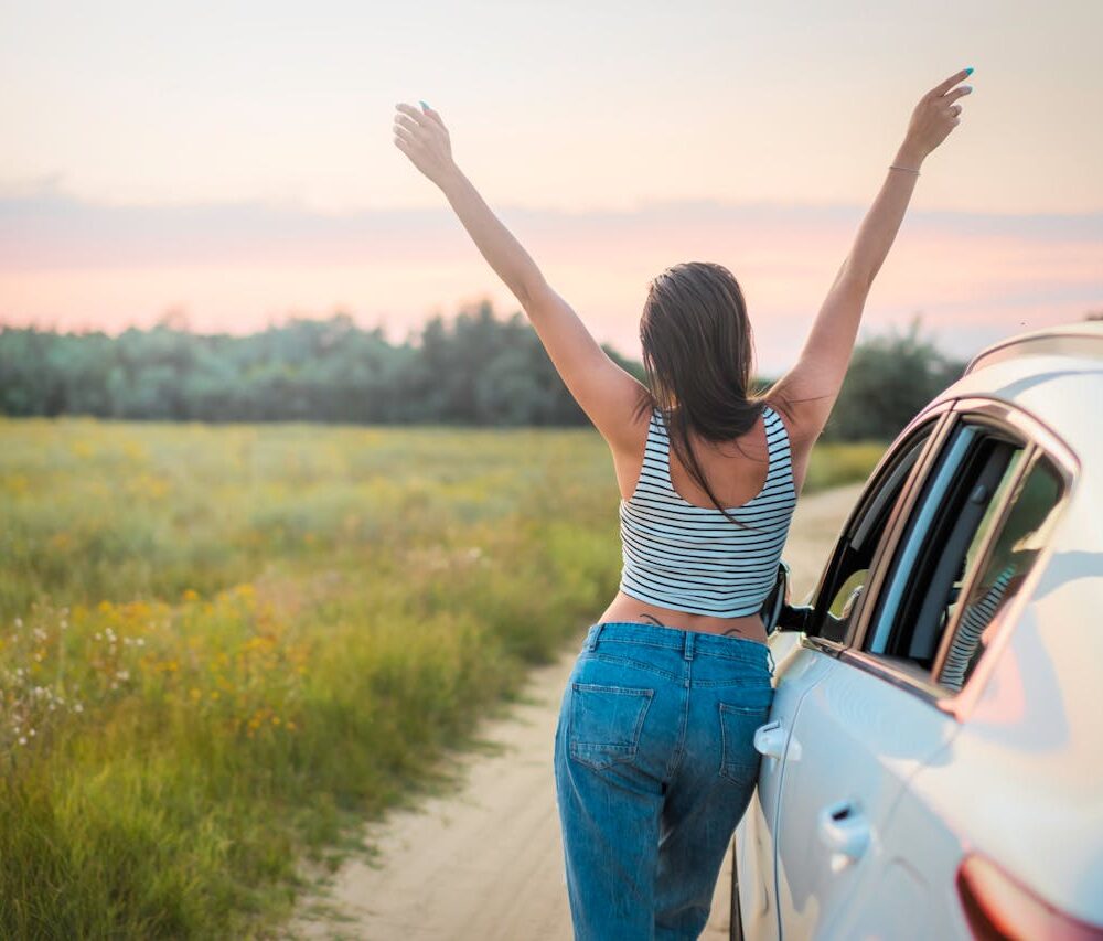 Woman on scenic road trip.