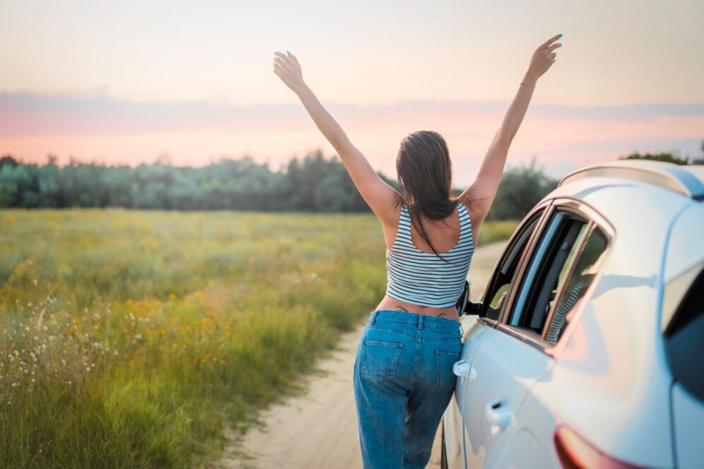 Woman on scenic road trip.